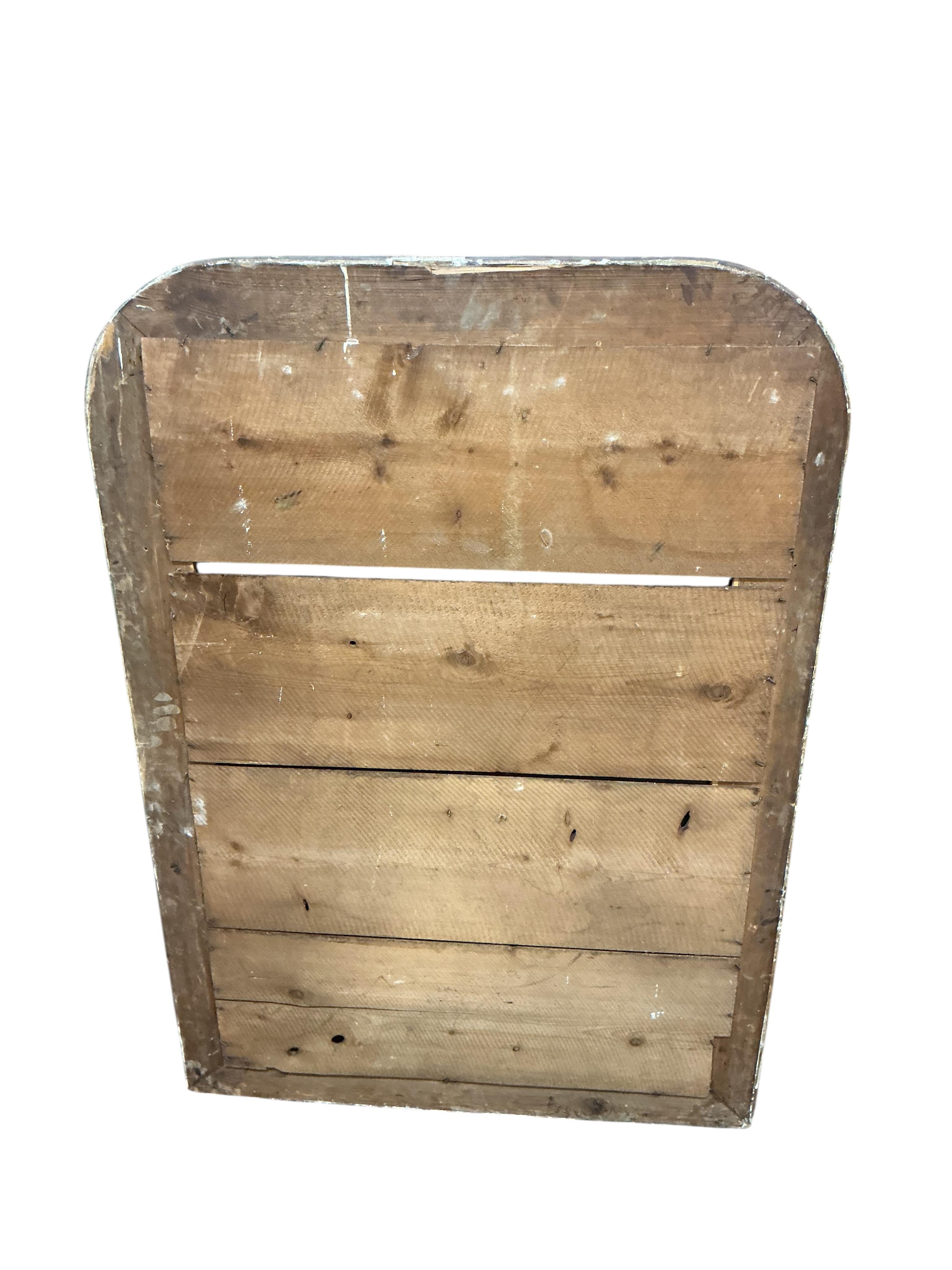 A 19th century wood and composition gilt overmantle mirror, later painted. Width 73cm, height 104cm.